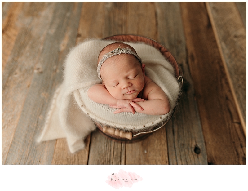 Baby girl in bucket
